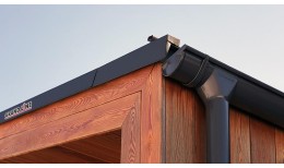 Угол желоба внешний Grand Line 135 гр 125 мм RAL 7024 мокрый асфальт