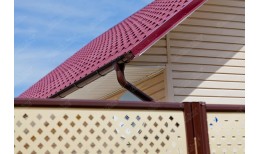 Угол желоба внешний Grand Line 90 гр 125 мм RAL 3005 красное вино