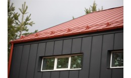 Фальц двойной стоячий Grand Line 0,45 Drap ST с пленкой на замках RAL 8004 терракота